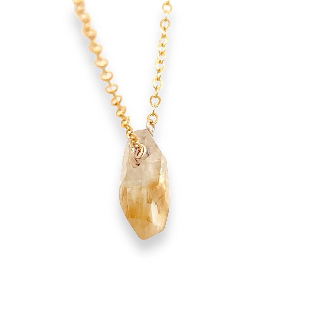 Citrine gold necklace side view 
