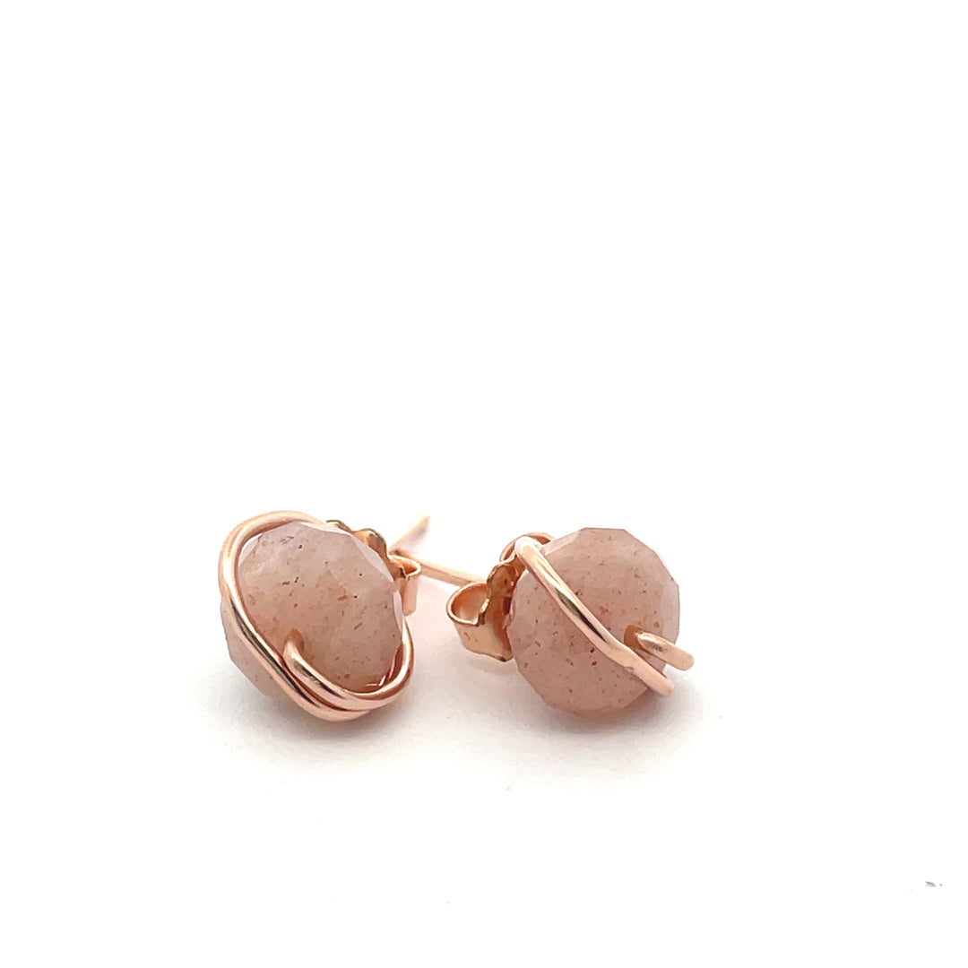 sunstone studs set in rose gold 